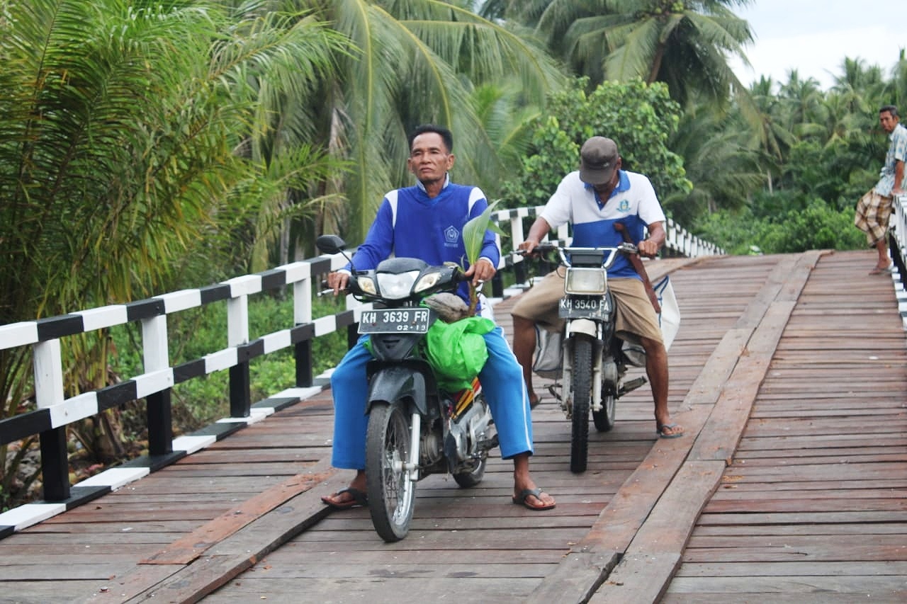Kini Warga Kegiatan Ekonomi Warga Semakin Lancar Berkat Hasil TMMD